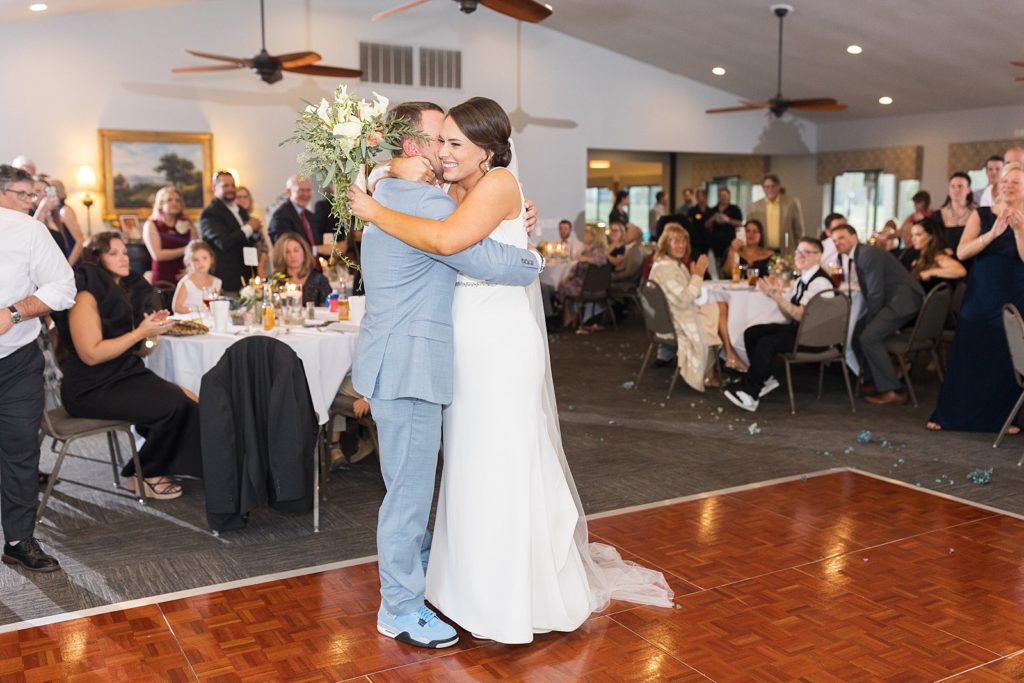 bride and groom embracing on the dance floor | Bentwinds Country Club Wedding | Fall Wedding | North Carolina Wedding | Raleigh NC Wedding Photographer | Sarah Hinckley Photography