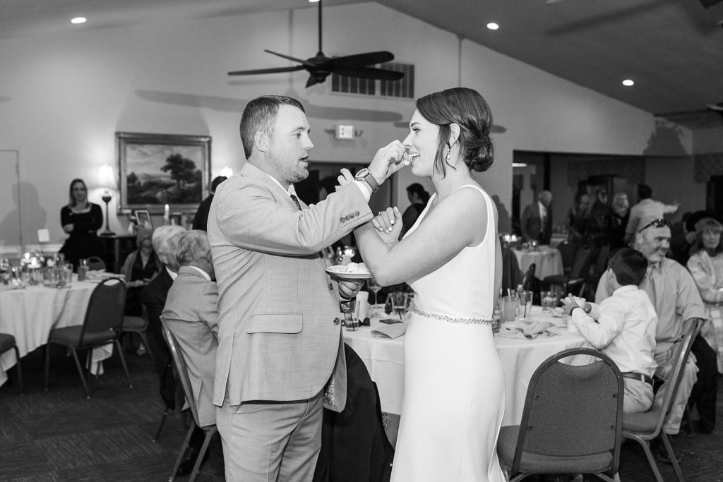 groom feeding cake to bride | Fall Wedding | Wedding | Raleigh NC Wedding Photographer 