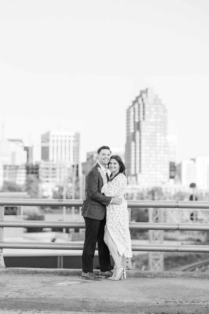 Engagement photos with city backdrop | Downtown Raleigh Engagement Photoshoot | Raleigh NC Wedding & Engagement Photographer | Sarah Hinckley Photography 