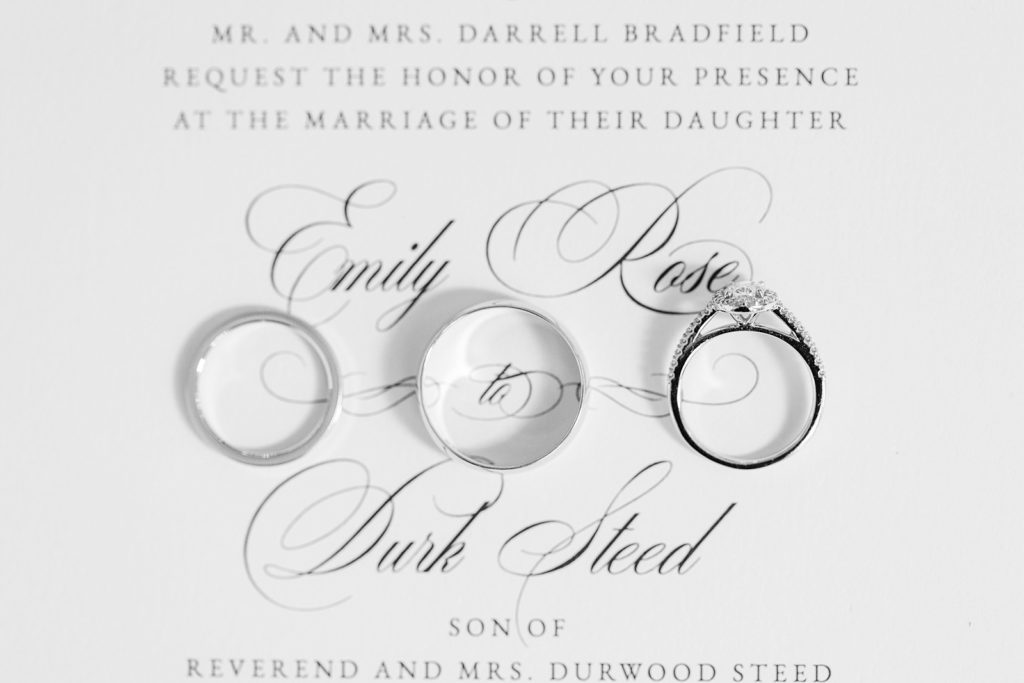 wedding bands sitting on wedding invitation | Fall Wedding at The Meadows in Raleigh | Raleigh NC Wedding Photographer