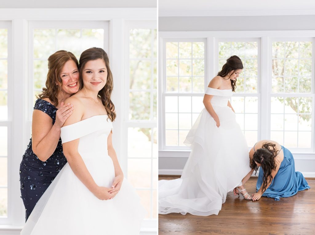 bride with her mother and maid of honor putting on brides shoes  | Wedding at The Meadows in Raleigh | Raleigh NC Wedding Photographer