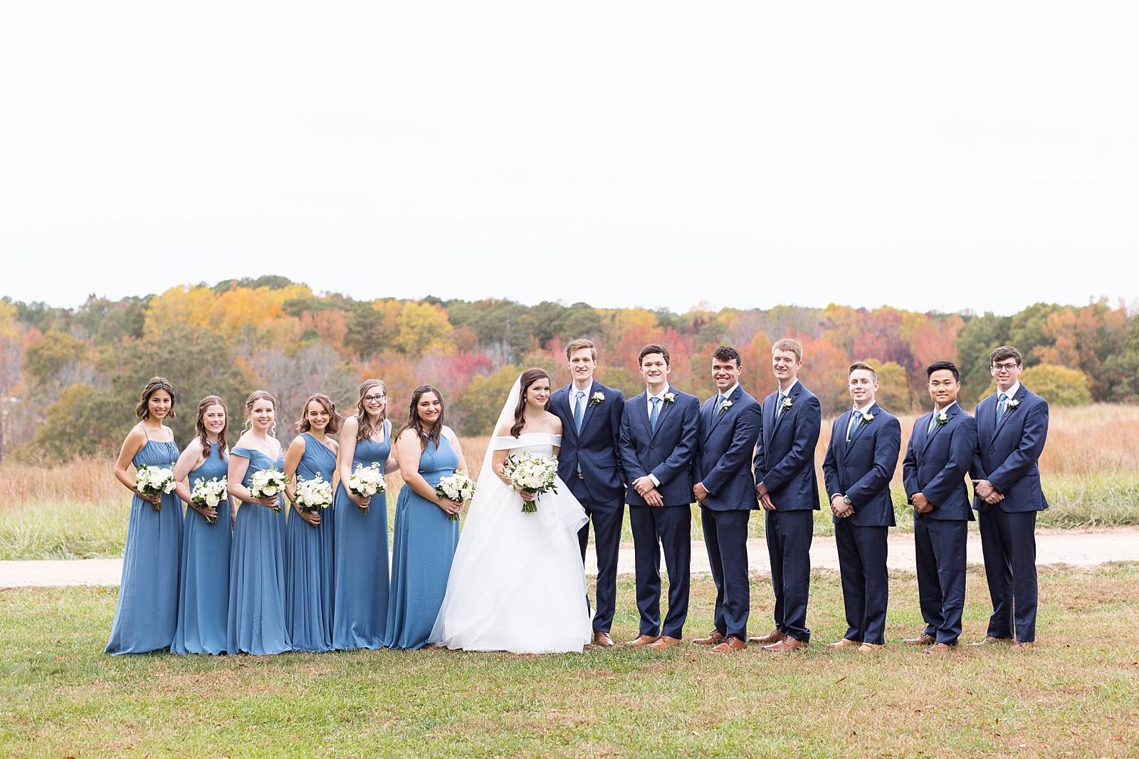 wedding party standing in the meadow   | Fall Wedding at The Meadows in Raleigh | Raleigh NC Wedding Photographer