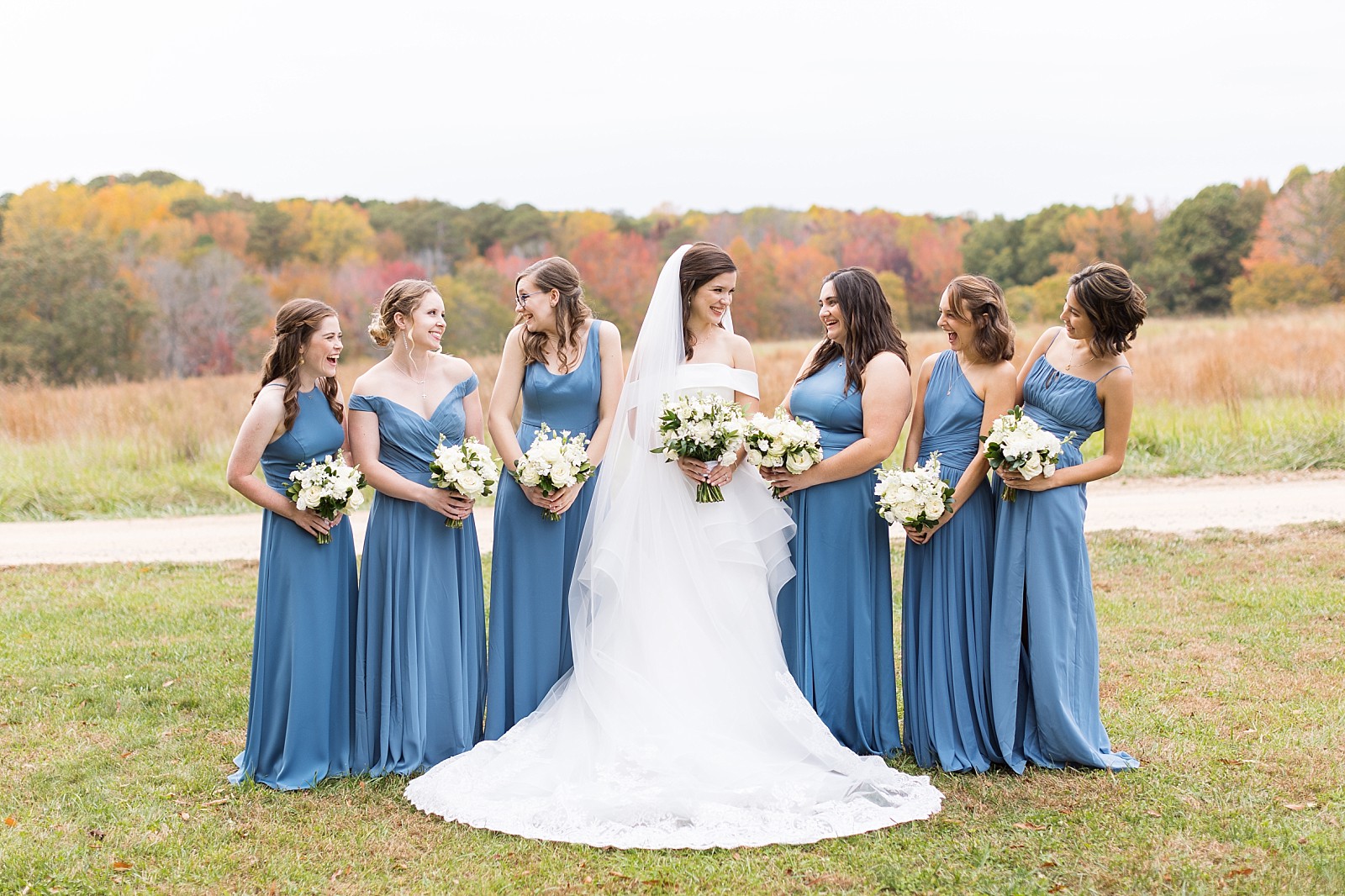 Bride with her bridesmaids outside | Fall Wedding at The Meadows in Raleigh | Raleigh NC Wedding Photographer