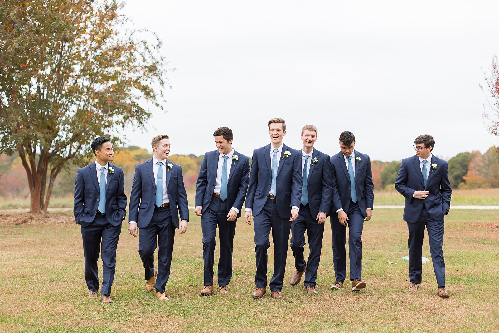 Groomsmen walking   | Fall Wedding at The Meadows in Raleigh | Raleigh NC Wedding Photographer
