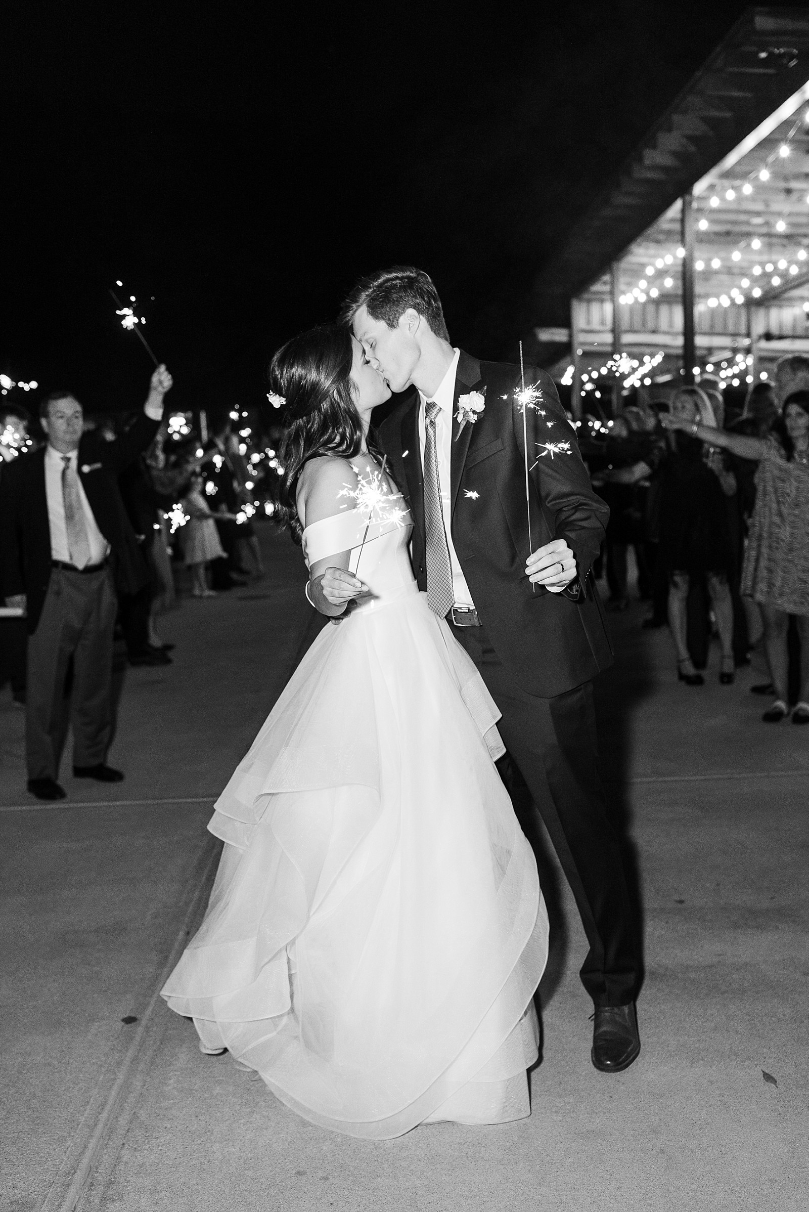 bride and groom kissing sparkler exit | Fall wedding at The Meadows in Raleigh | Raleigh NC Wedding Photographer