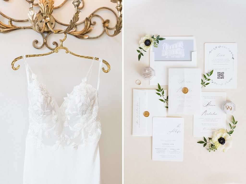 wedding dress hanging on antique gold hanger and white, gold and dusty blue invitation suite | dusty blue fall wedding day at The Merrimon-Wynne house | Raleigh NC Wedding Photographer