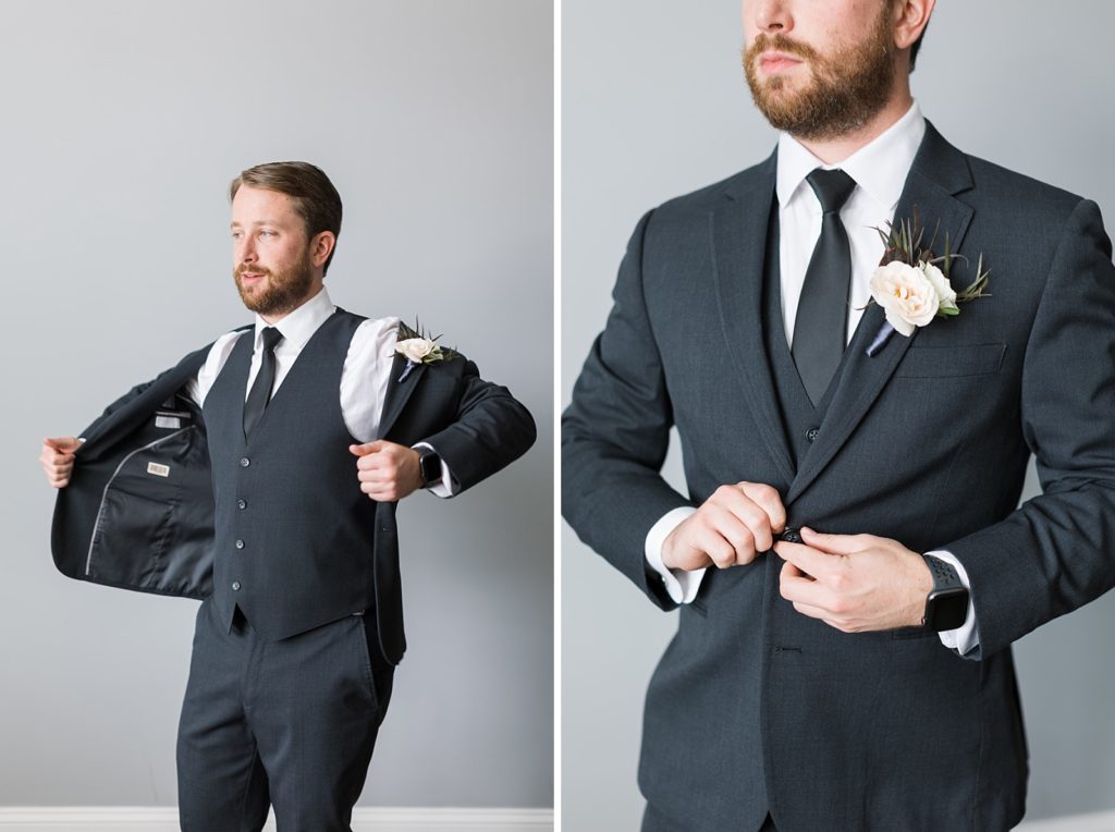 groom putting on his suit jacket and buttoning it  | Fall wedding at Walnut Hill in Raleigh NC | Raleigh NC wedding photographer 