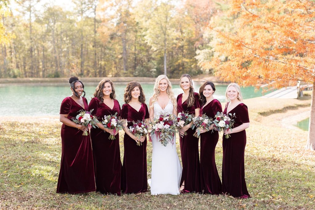 bridesmaids wearing burgundy velvet dresses  | Fall wedding at Walnut Hill in Raleigh NC | Raleigh NC wedding photographer 