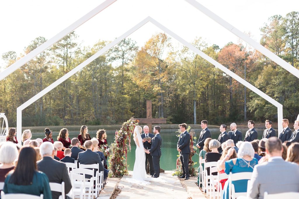 bride and groom during their ceremony  | Fall wedding at Walnut Hill in Raleigh NC | Raleigh NC wedding photographer 