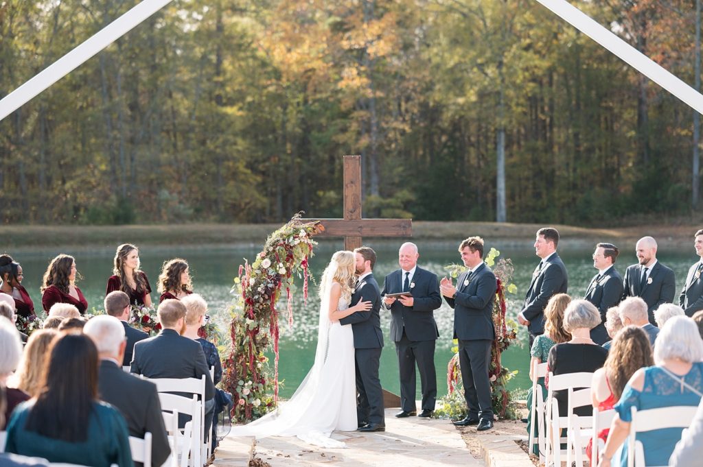 first kiss as husband and wife | Fall wedding at Walnut Hill in Raleigh NC | Raleigh NC wedding photographer 