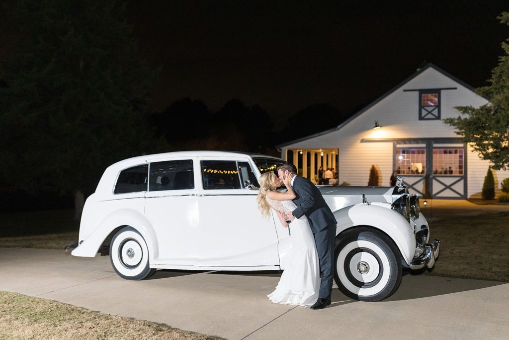 bride and groom in front of Rolls Royce getaway car| Fall wedding at Walnut Hill in Raleigh NC | Raleigh NC wedding photographer 