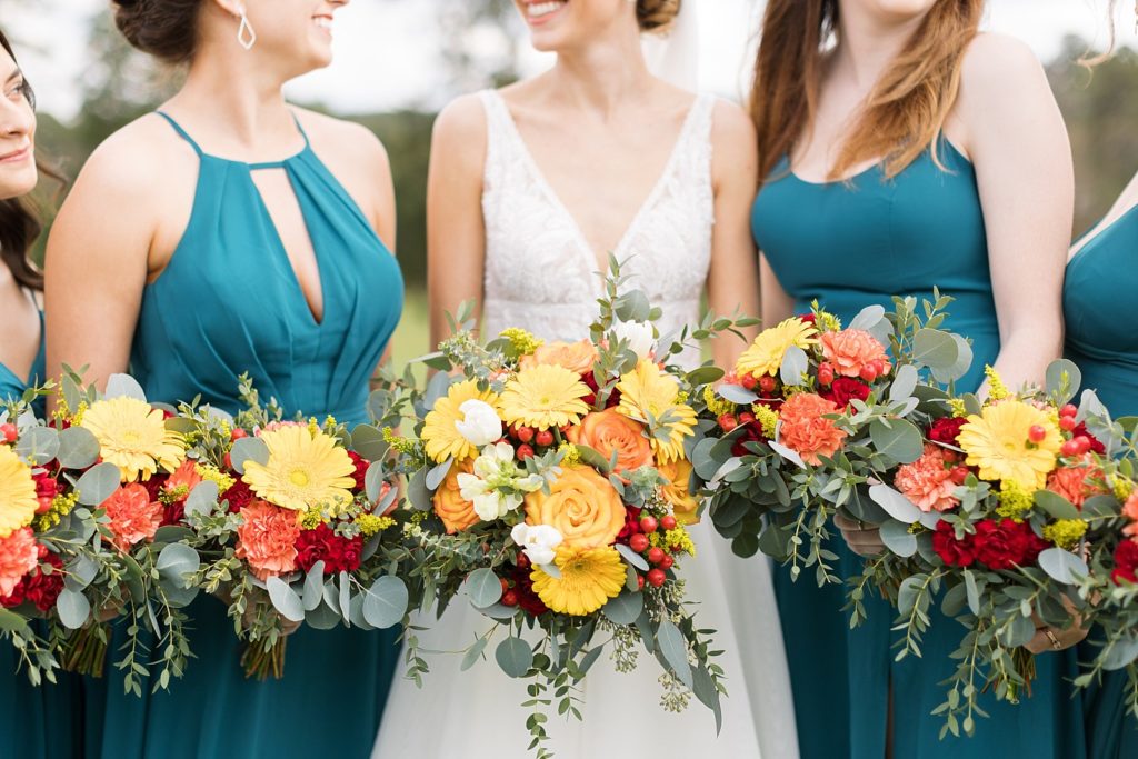 details of fall colored florals with eucalyptus | Fall wedding at Hope Valley Country Club | Durham Wedding | Raleigh NC wedding photographer 