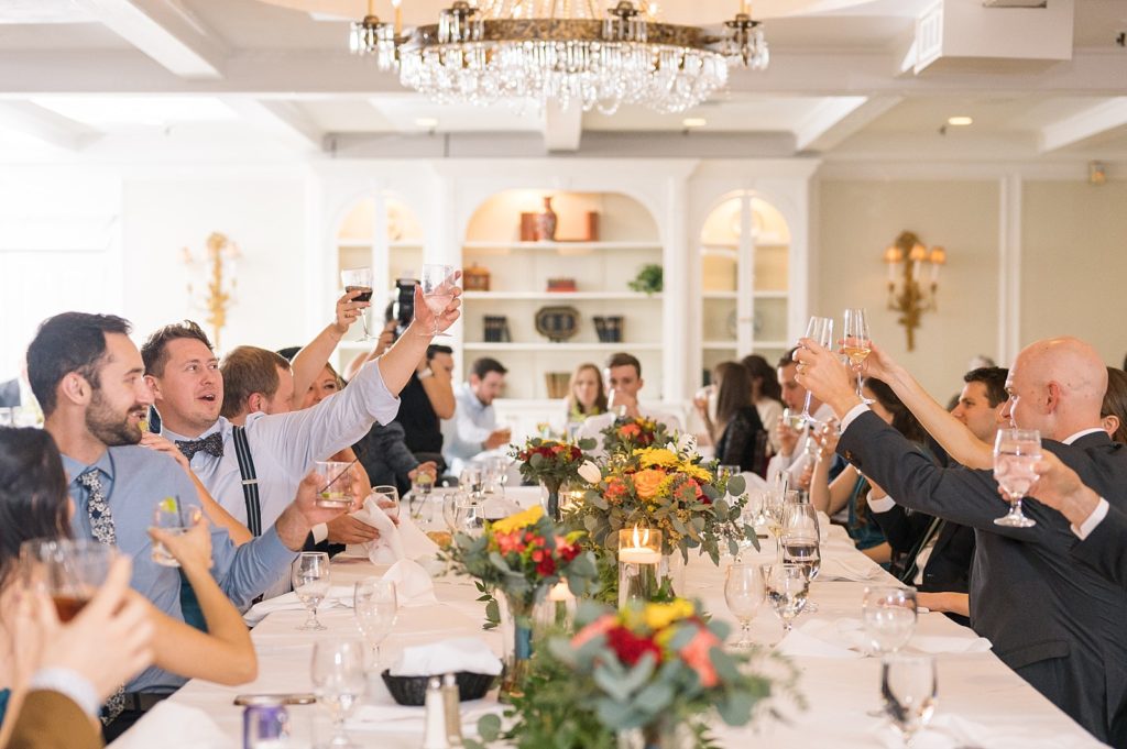 Guests toasting  | Fall wedding at Hope Valley Country Club | Durham Wedding | Raleigh NC wedding photographer 