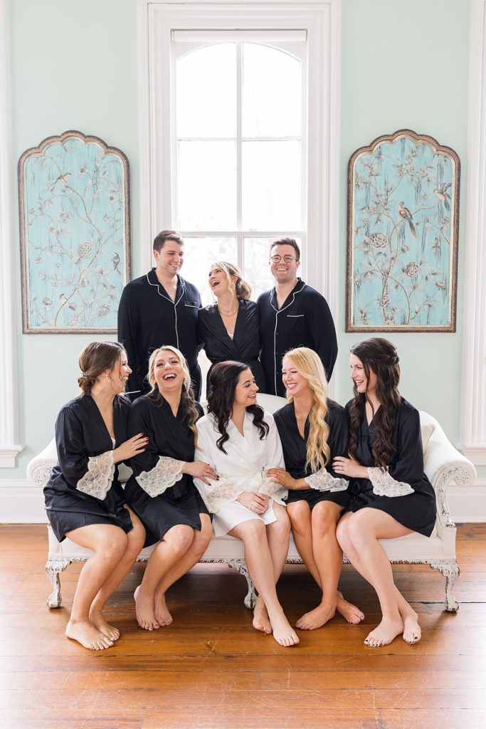 Bride with her bridesmaids wearing black and lace pjs | Classic Black and white wedding at Merrimon-Wynne | Raleigh NC Wedding Photographer 