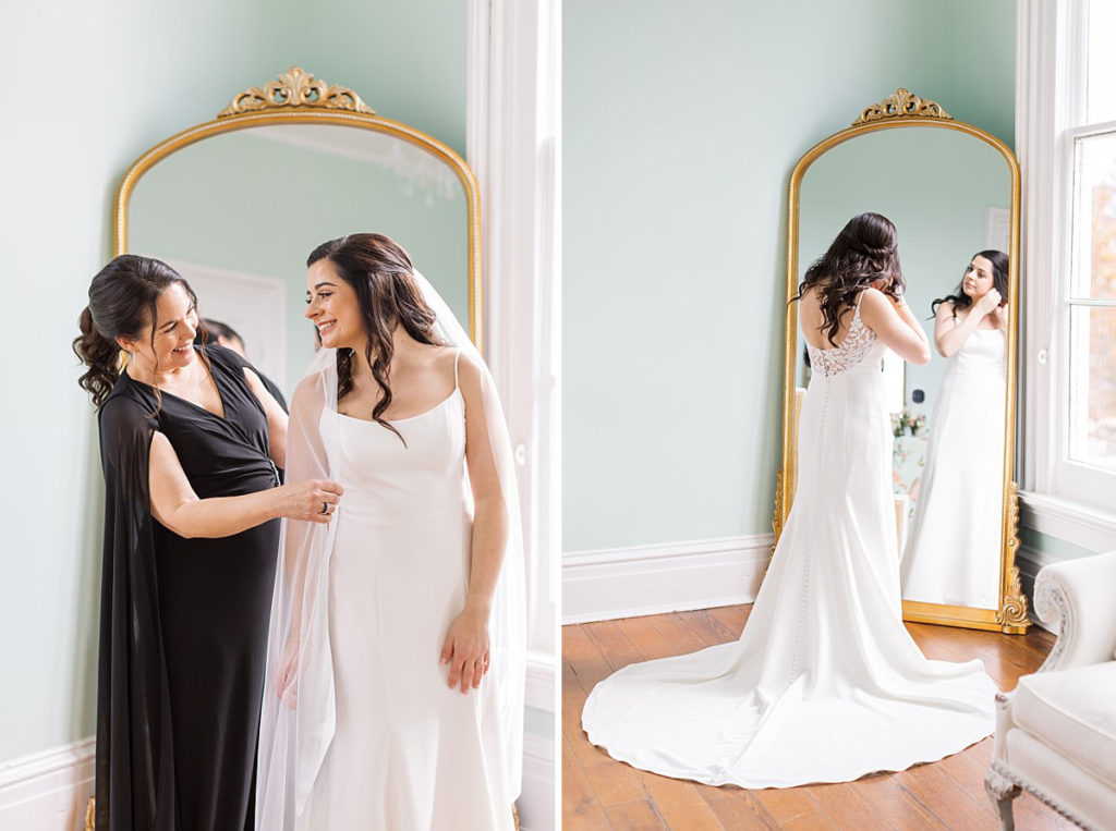 Bride smiling at her mom and bride looking in the mirror putting her earrings on | Classic Black and white wedding at Merrimon-Wynne | Raleigh NC Wedding Photographer 
