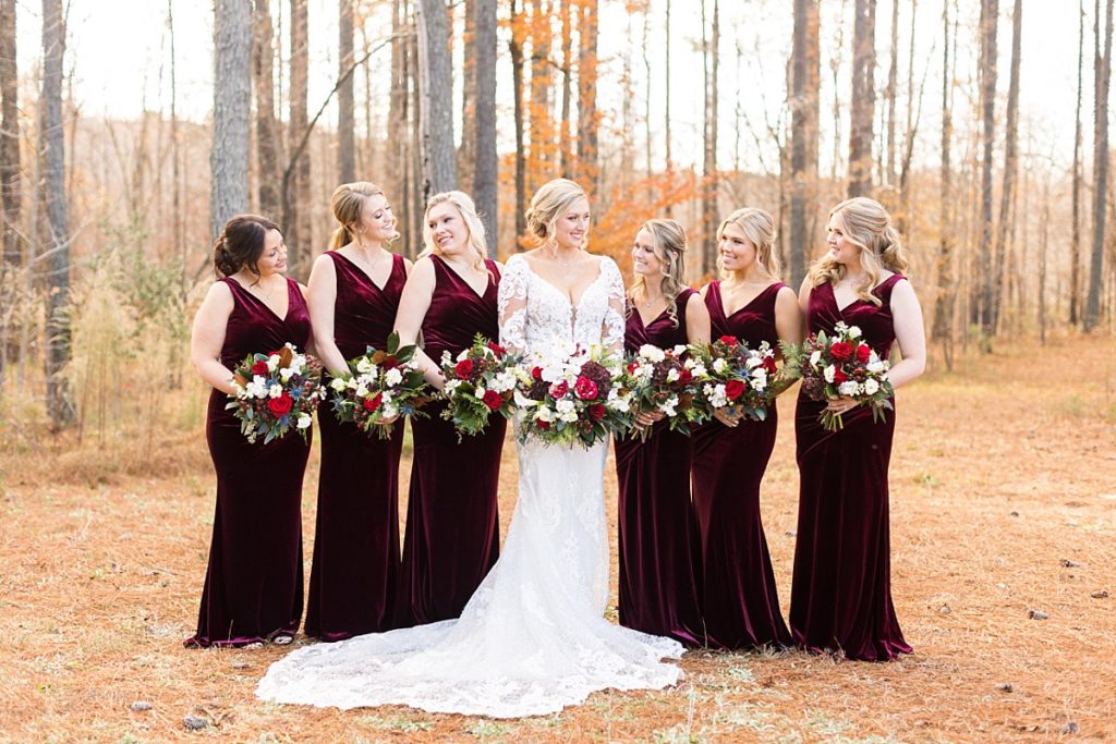 Bride and her bridesmaids for christmas wedding | Christmas Wedding at Pinehill Pavilion | Raleigh NC Wedding Photographer 
