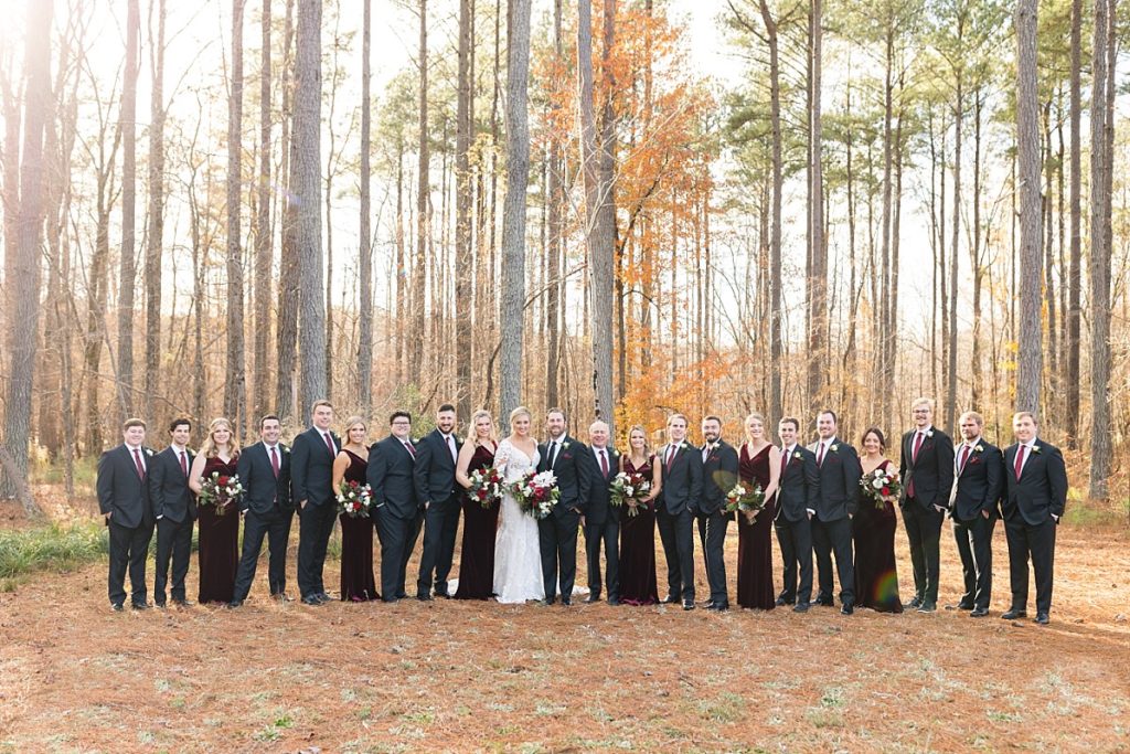 Bride and groom with their wedding party | Christmas Wedding at Pinehill Pavilion | Raleigh NC Wedding Photographer 