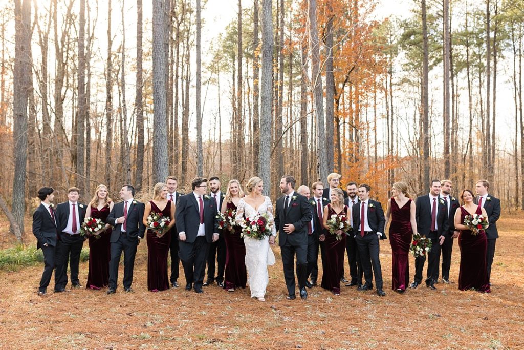 Wedding party walking outside | Christmas Wedding at Pinehill Pavilion | Raleigh NC Wedding Photographer 