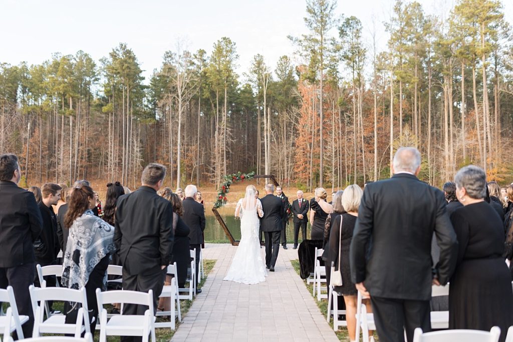 Bride walking down the aisle | Christmas Wedding at Pinehill Pavilion | Raleigh NC Wedding Photographer 