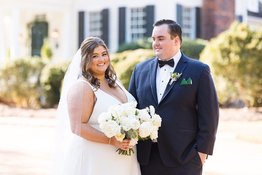 Groom looking at his bride | Emerald Christmas Wedding at The Sutherland Estate | Raleigh NC Wedding Photographer