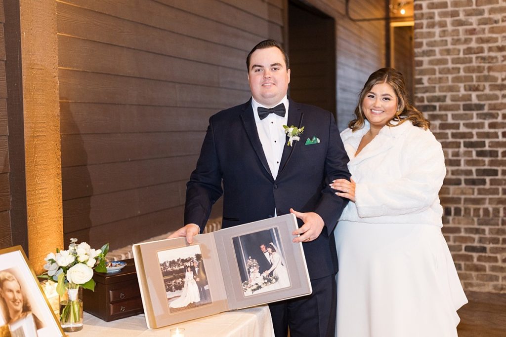 Bride and groom with photos of those they lost | Emerald Christmas Wedding at The Sutherland Estate | Raleigh NC Wedding Photographer