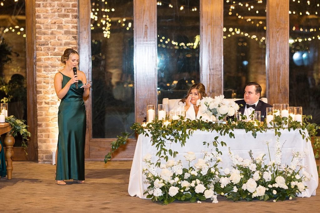 Bride and groom during MOH speech | Emerald Christmas Wedding at The Sutherland Estate | Raleigh NC Wedding Photographer