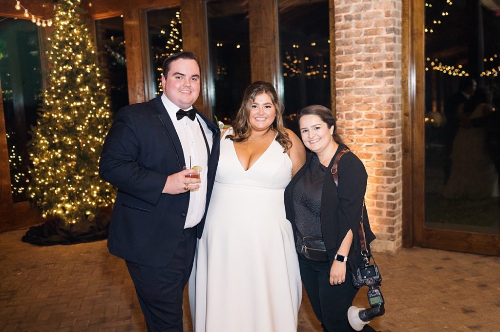 Bride and groom with Photographer Sarah Hinckley  | Emerald Christmas Wedding at The Sutherland Estate | Raleigh NC Wedding Photographe