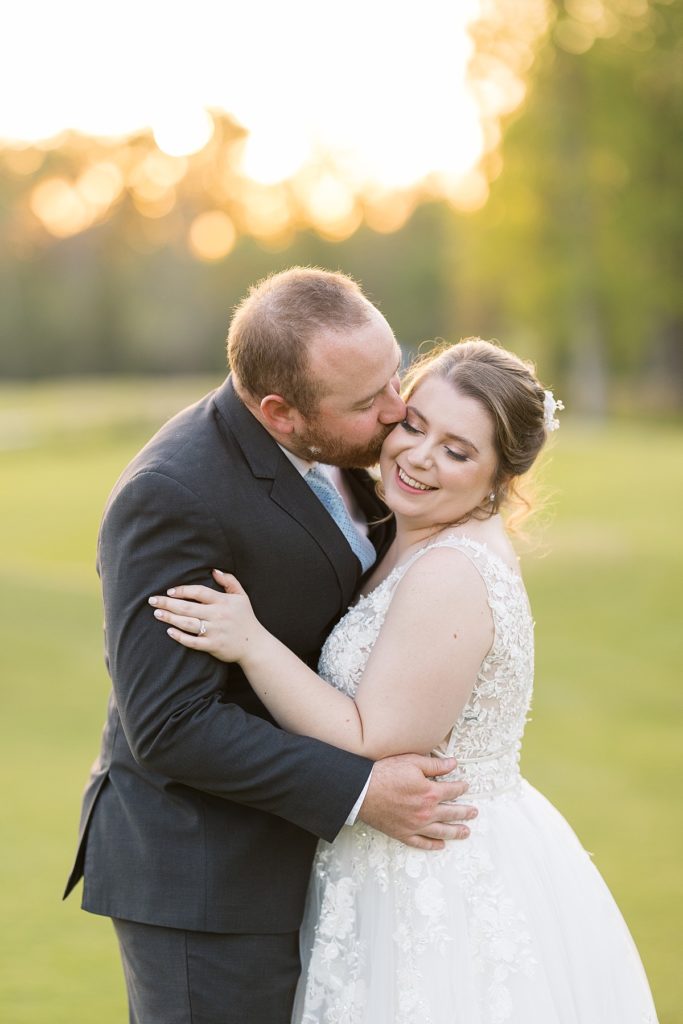 Bride and groom embracing | Raleigh NC wedding photographer 