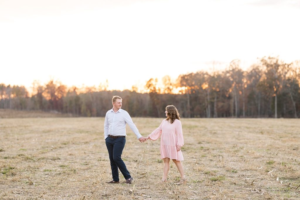 groom to be looking at his bride to be | Fall Engagement Photo Session at The Farmstead | Raleigh NC Wedding & Engagement Photographer 