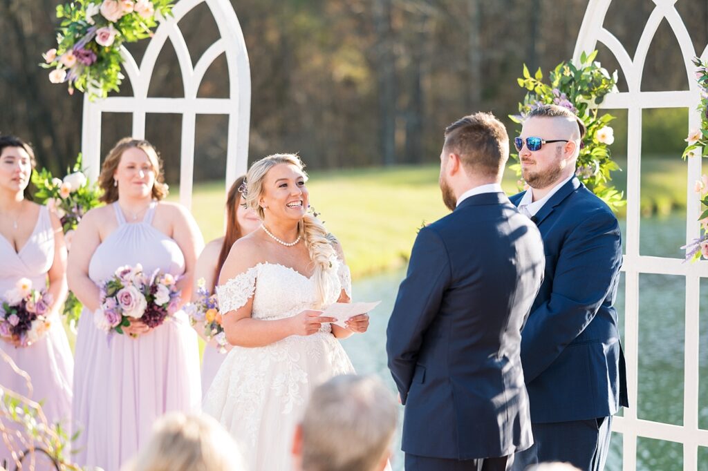 Bride during her vows to her groom | Tangled Inspired Spring Wedding at Walnut Hill | Raleigh NC Wedding Photographer