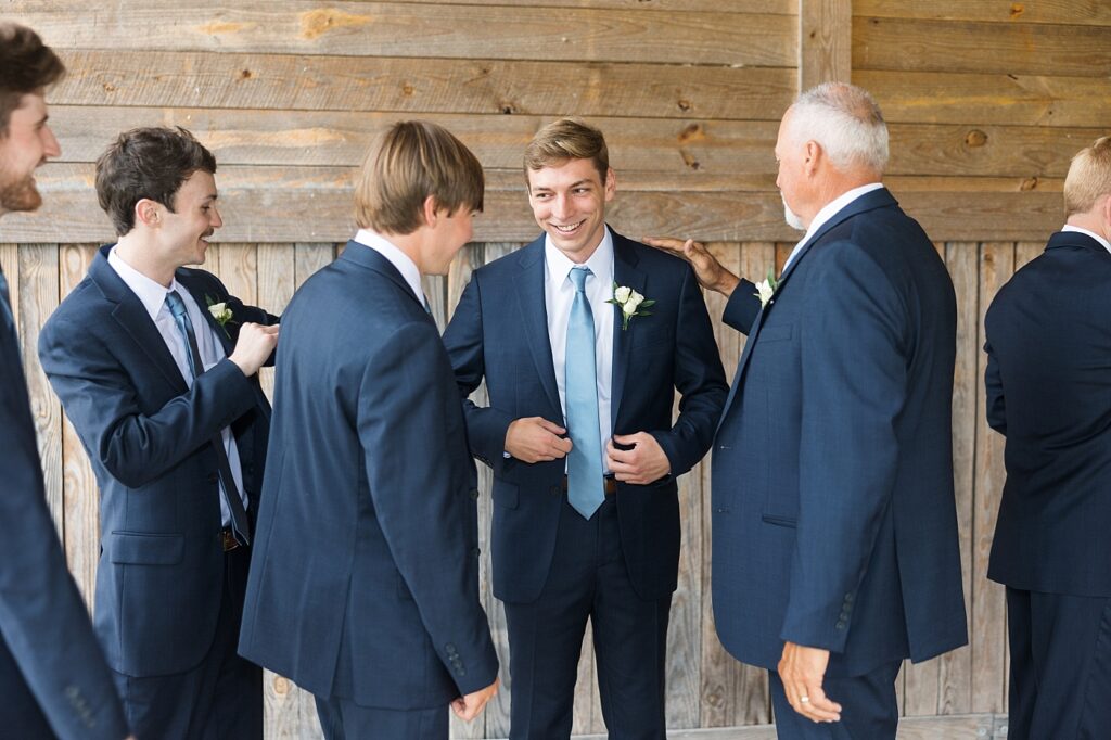Groom with his groomsmen | Amazing Graze Barn Wedding | Amazing Graze Barn Wedding Photographer