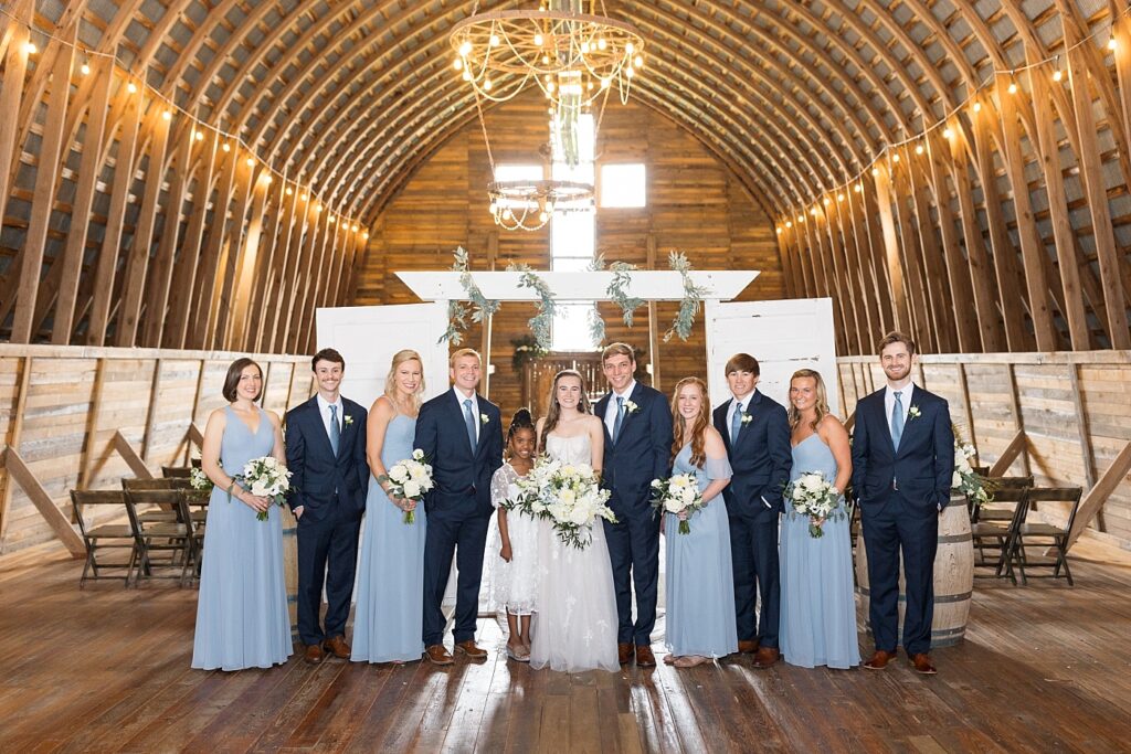 Bride and groom with wedding party | Amazing Graze Barn Wedding | Amazing Graze Barn Wedding Photographer