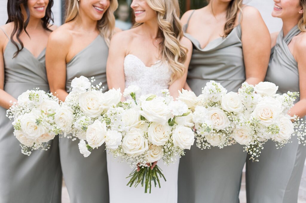 Bridesmaids showing white bouquets | The Bradford Wedding | The Bradford Wedding Photographer 