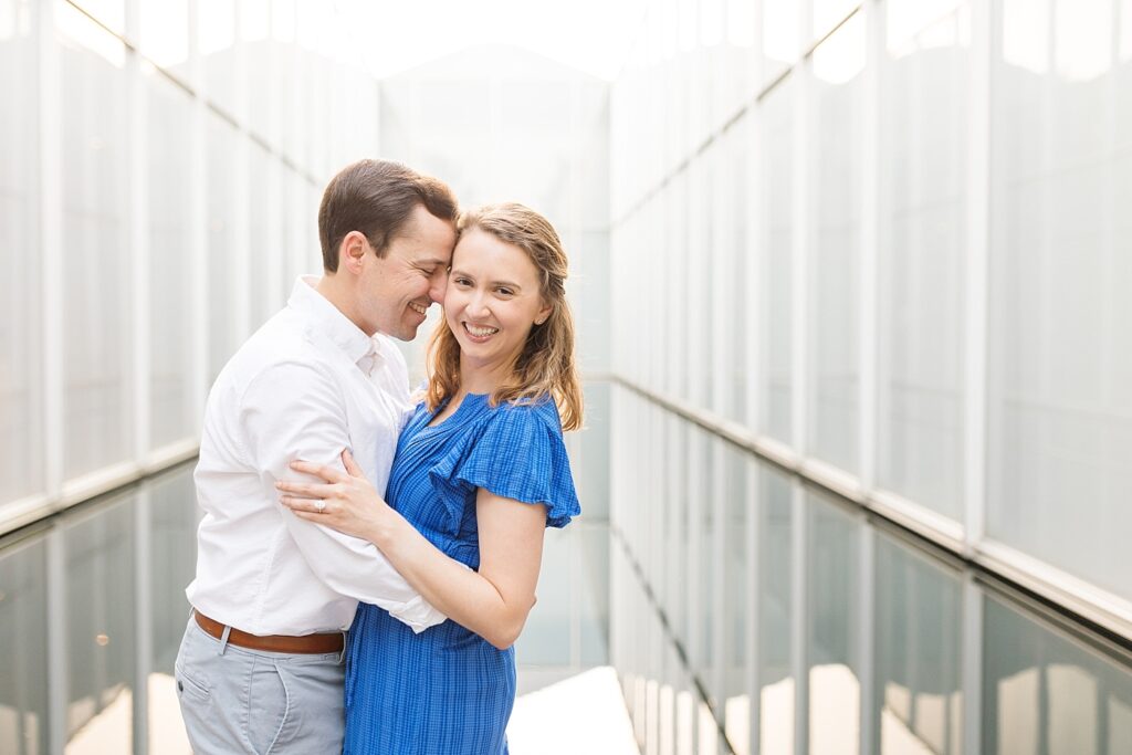 Spring engagement photos | couple posing by reflecting pool | Raleigh NC Engagement Photographer | Raleigh NC Museum of Art Engagement Session