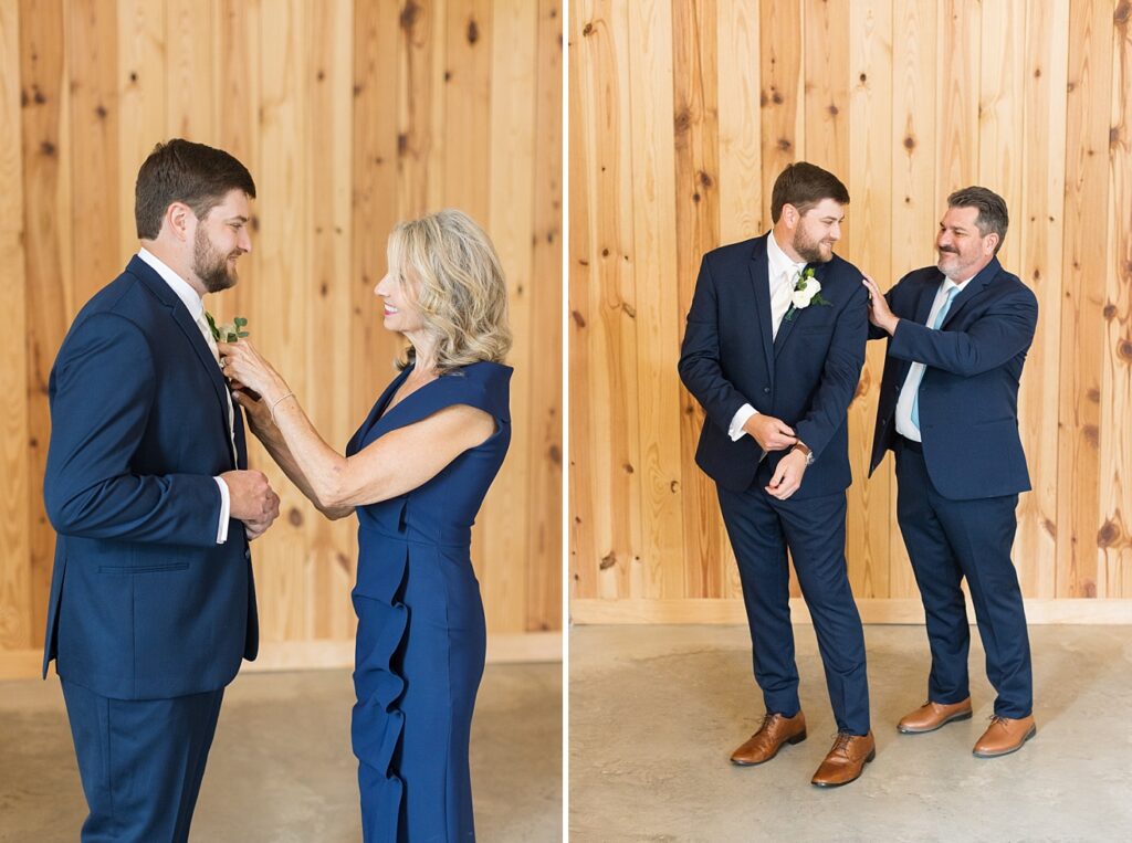 Groom's mom putting on groom's boutonniere and groom's dad helping groom with suit jacket | The Evermore Wedding | The Evermore Wedding Photographer | Raleigh NC Wedding Photographer