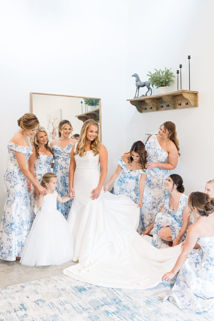 Bride's first look with bridesmaids | classic blue and white wedding | The Evermore Wedding | The Evermore Wedding Photographer | Raleigh NC Wedding Photographer