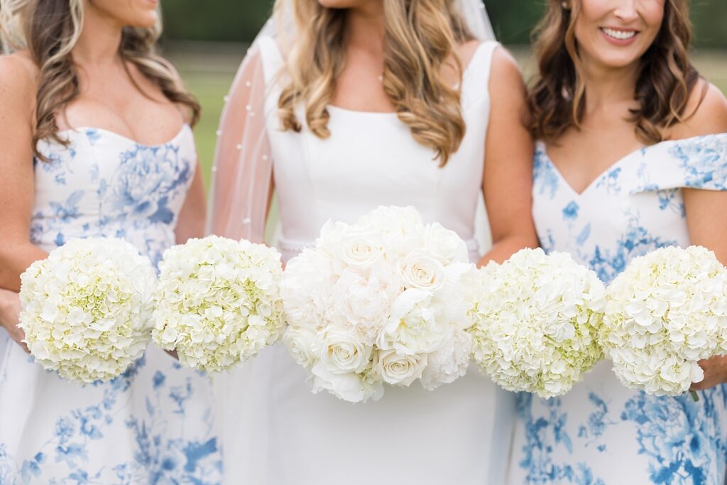Bridesmaids holding peony bouquet with bride | The Evermore Wedding | The Evermore Wedding Photographer | Raleigh NC Wedding Photographer
