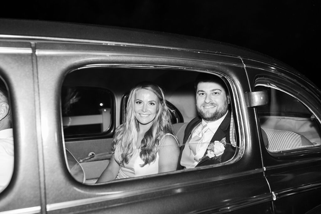 Bride and groom sitting inside classic car | The Evermore Wedding | The Evermore Wedding Photographer | Raleigh NC Wedding Photographer