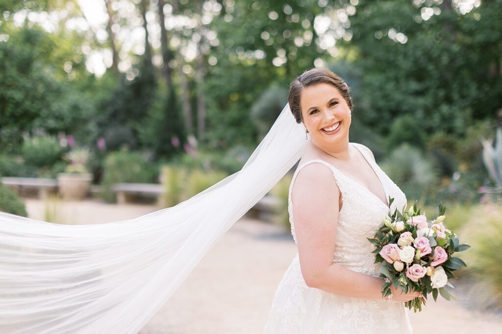 Bride posing with veil and bouquet | Bridal Portraits at Duke Gardens | Raleigh NC Wedding Photographer | Bridal Portrait Photographer