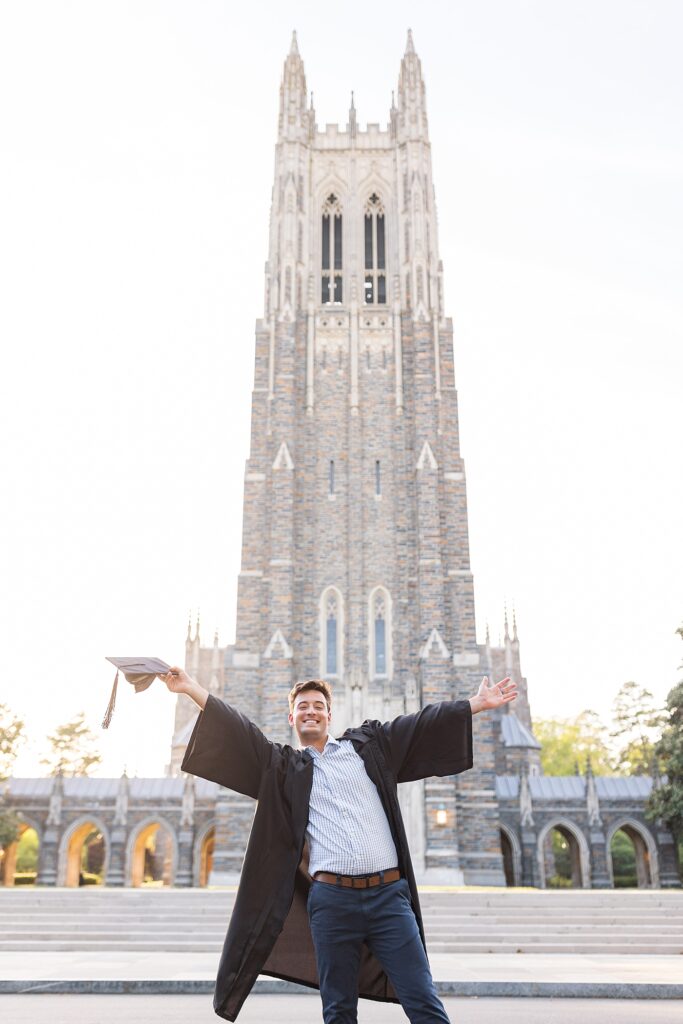 Grad student smiling in front of Duke Chapel | Duke University Grad | Durham Senior Photographer