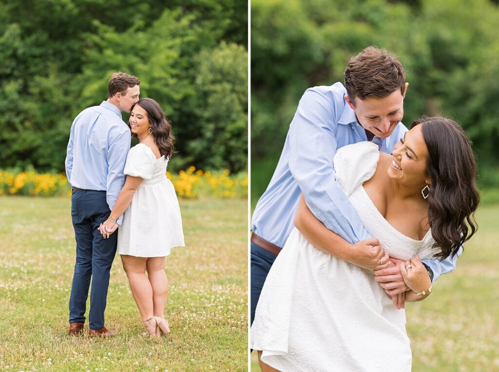 Couple holding hands and embracing in open field | Raleigh NC Engagement Photographer | Historic Oak View Engagement Session