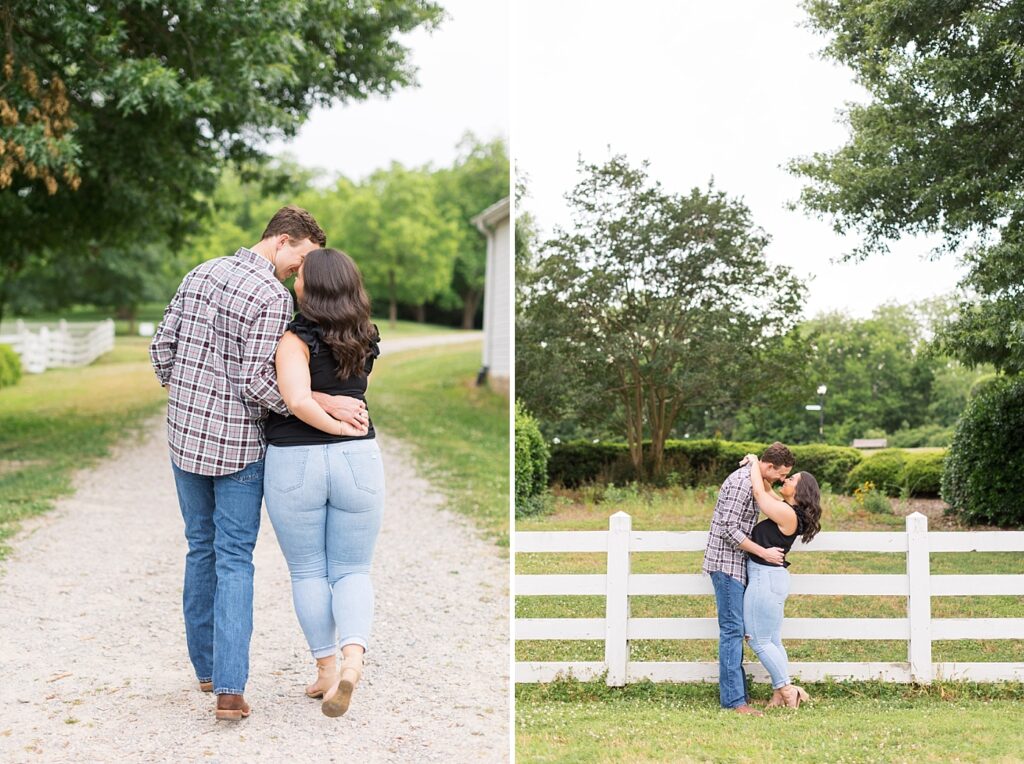 Couple holding hands and kissing in front of white fence | Raleigh NC Engagement Photographer | Historic Oak View Engagement Session