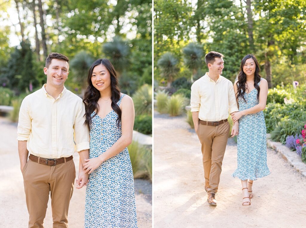 Couple embracing and walking in garden | Duke Gardens engagement photos | Raleigh NC wedding photographer 