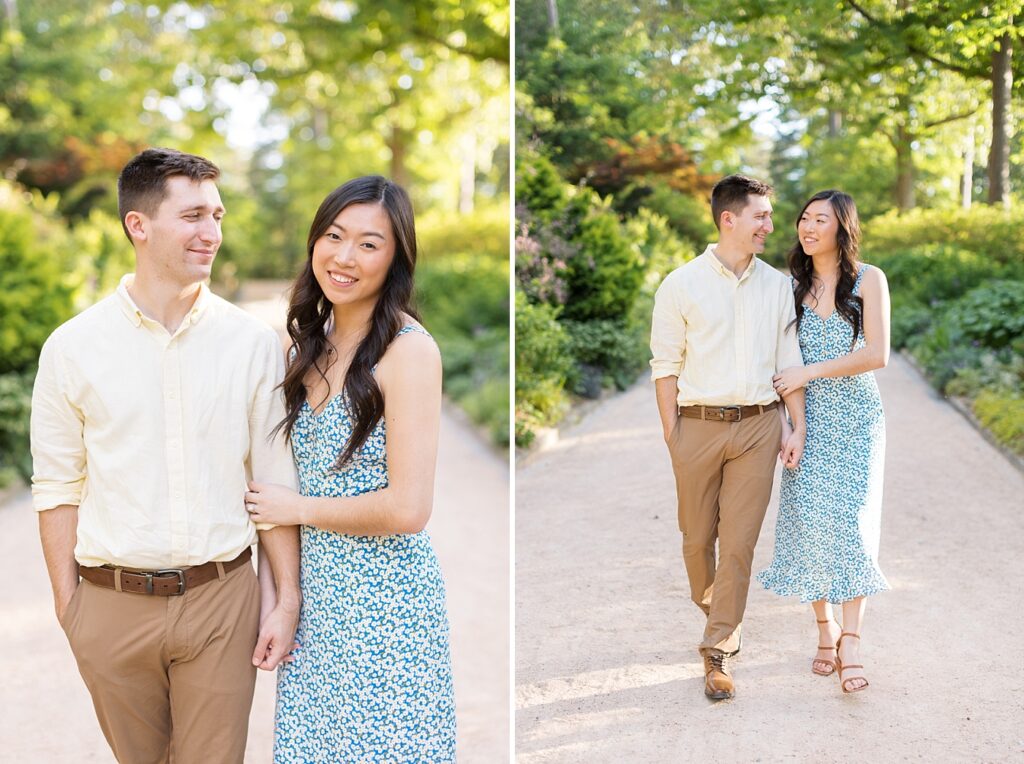 Couple walking through garden | Duke Gardens engagement photos | Raleigh NC wedding photographer 