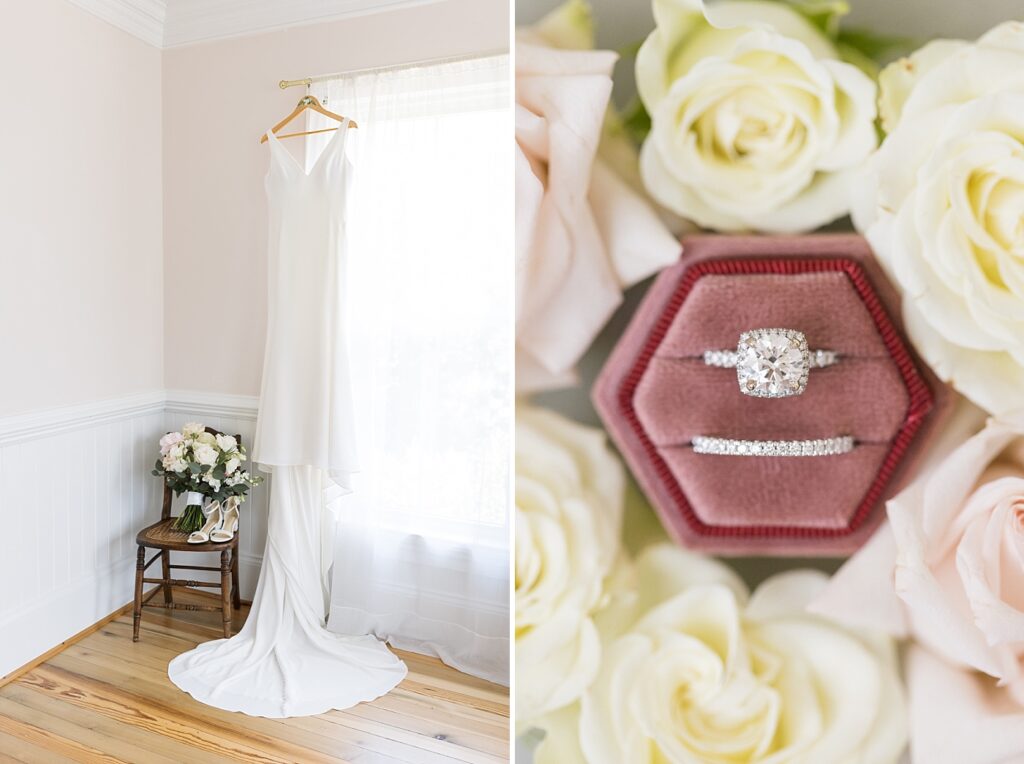 Bride's wedding dress hanging near window and wedding rings displayed in dark pink display box surrounded by white and pink flowers | Spring Wedding | The Matthews House Wedding | The Matthews House Wedding Photographer | Raleigh NC Wedding Photographer