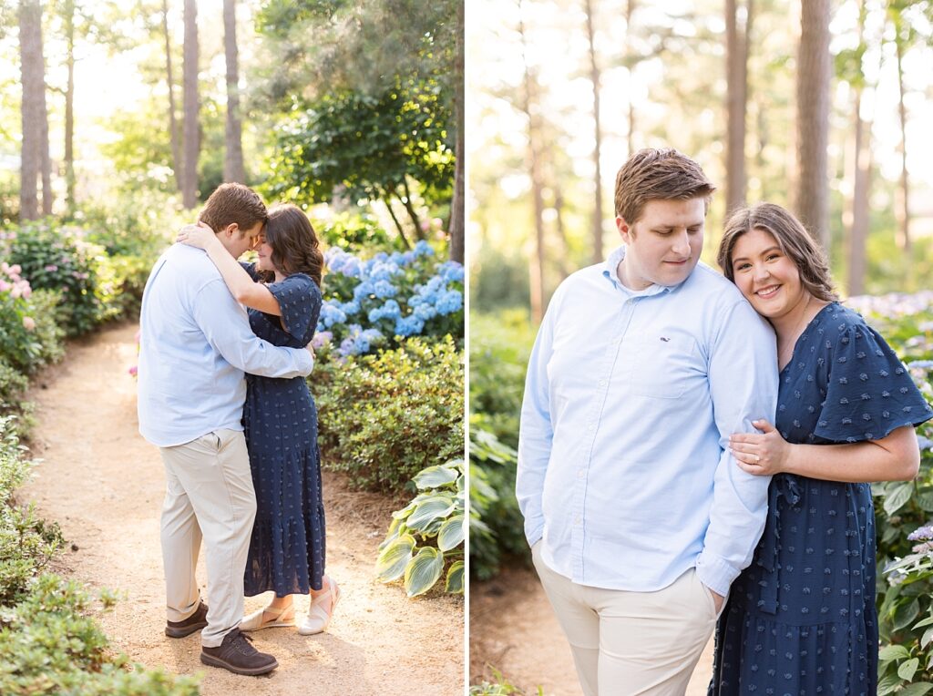 Couple embracing in garden with blue flowers | WRAL Gardens engagement photos | Raleigh NC wedding photographer 
