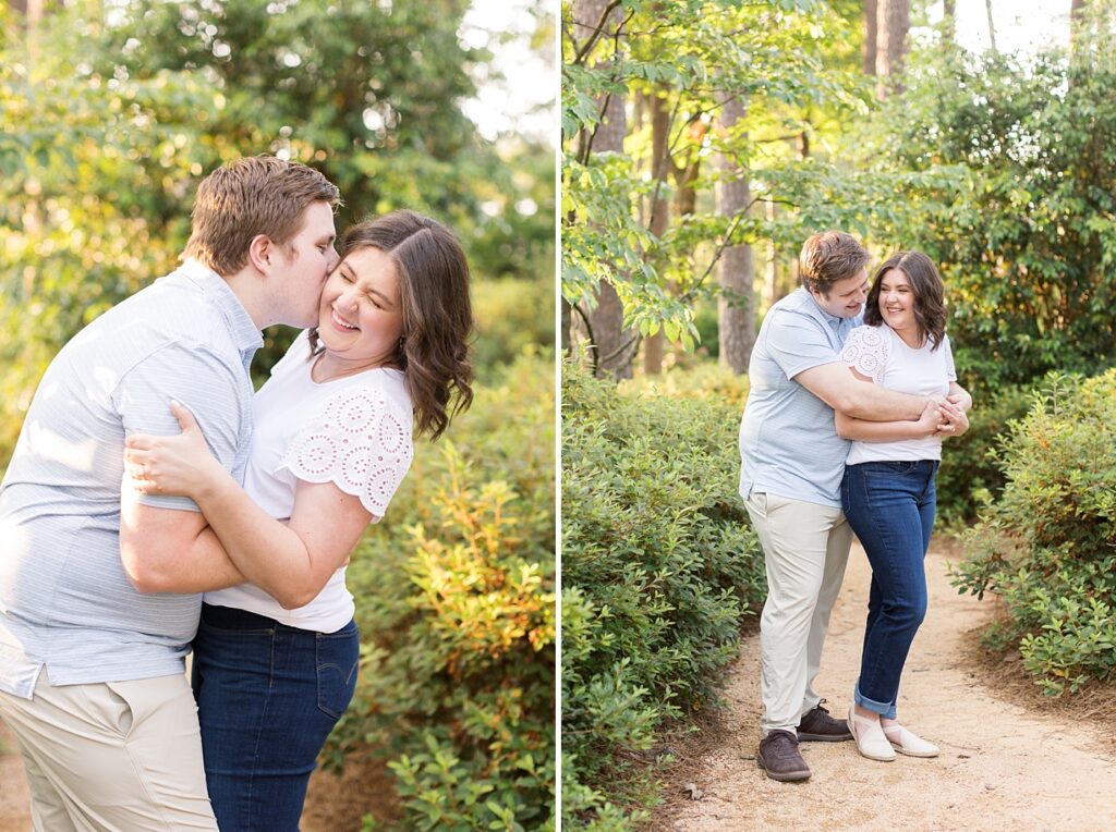 Couple embracing in garden | WRAL Gardens engagement photos | Raleigh NC wedding photographer 