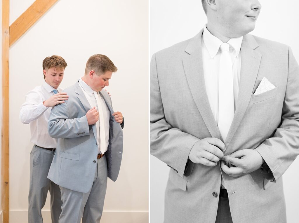 Groomsmen helping groom put on suit jacket | Blue and white Wedding | Carolina Groves Wedding | Carolina Groves Wedding Photographer | Raleigh NC Wedding Photographer