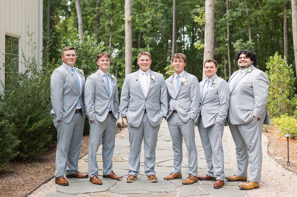 Groom smiling with groomsmen | Blue and white Wedding | Carolina Groves Wedding | Carolina Groves Wedding Photographer | Raleigh NC Wedding Photographer