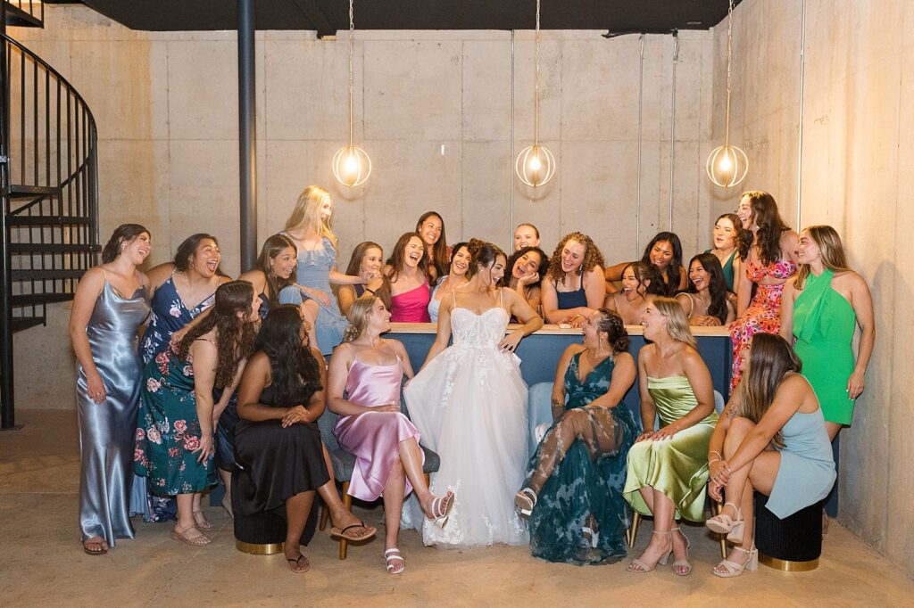 Bride smiling with softball teammates | Blue and white Wedding | Carolina Groves Wedding | Carolina Groves Wedding Photographer | Raleigh NC Wedding Photographer